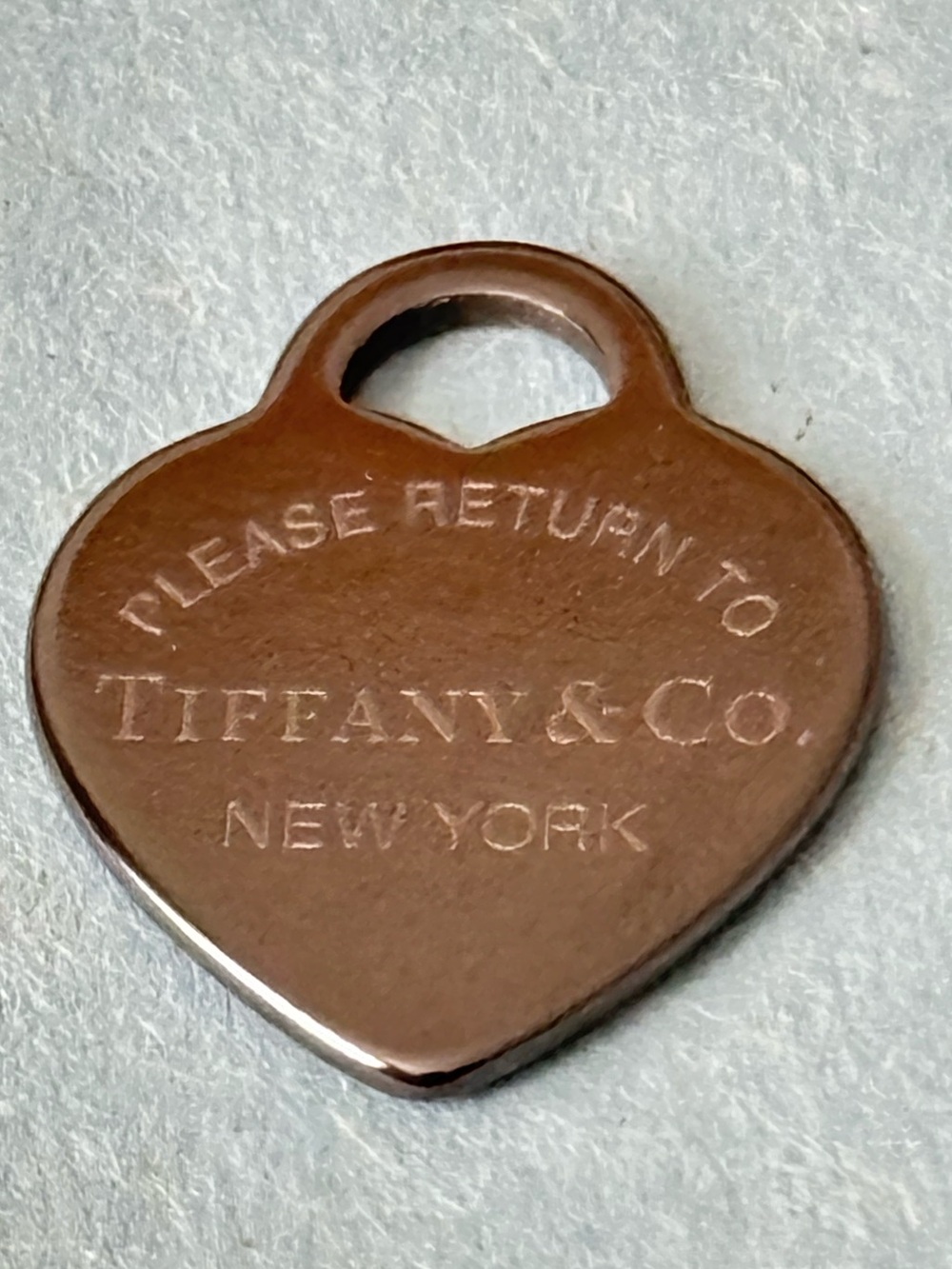 TIFFANY & CO. SMALL TITANIUM HEART CHARM